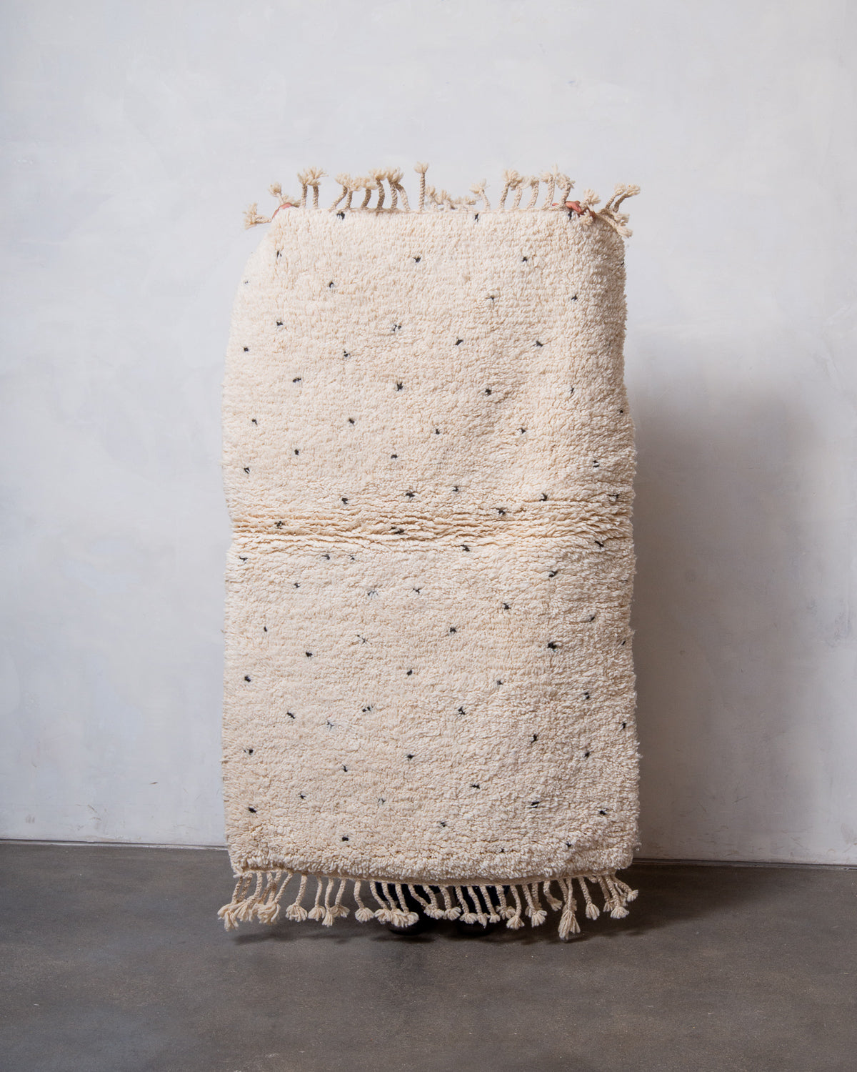 Modern, designer, handcrafted Berber rug from Morocco. Beniourain carpet with beautiful colours and patterns and fluffy wool texture.